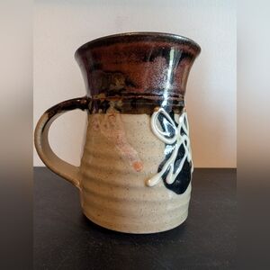 Handcrafted Ceramic Mug with Artistic Design